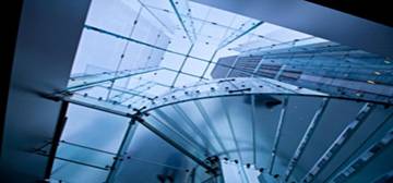 Modern glass staircase viewed from below